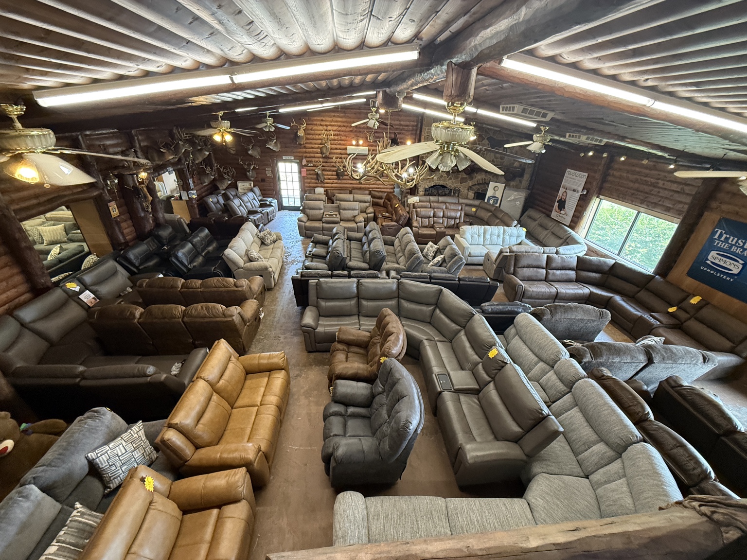 Sofas, recliners, and sectionals in the BoxDrop Exit 210 furniture showroom in Cuba, Missouri